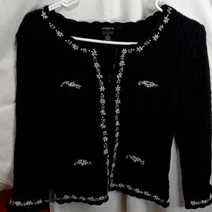 Crystal and pearl embellished sweater cardigan.